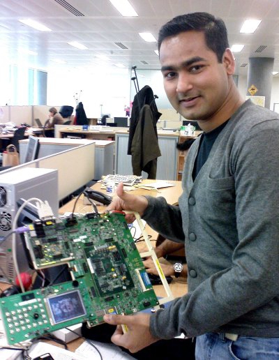 Deep, a developer at Symbian, holds up a development board running the demo