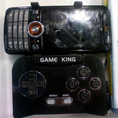 A phone with a large, plasticy-looking gamepad attached to its side
