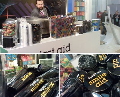 Photo collage of a coffee stand with the barista and some close-ups of Symbian-branded lip balm